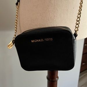 Michael Kors small cross body bag. Gently used